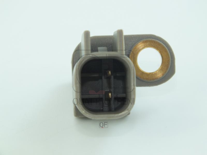 ABS sensor close-up showing connector and mounting bracket